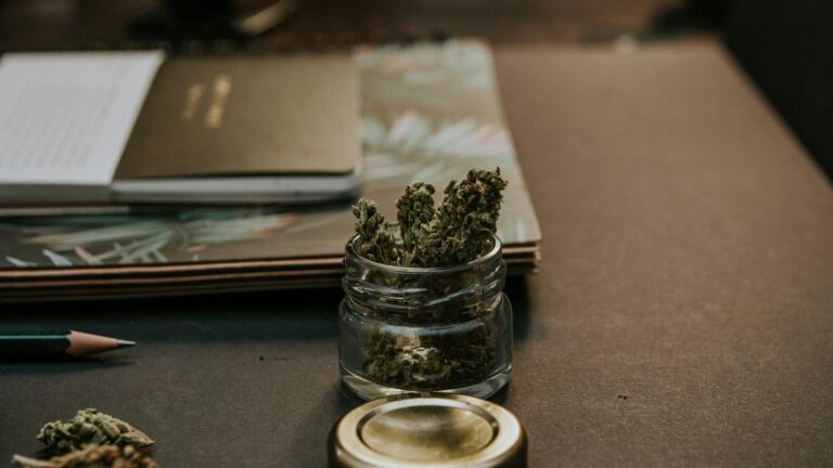 close up photo of kush on glass container