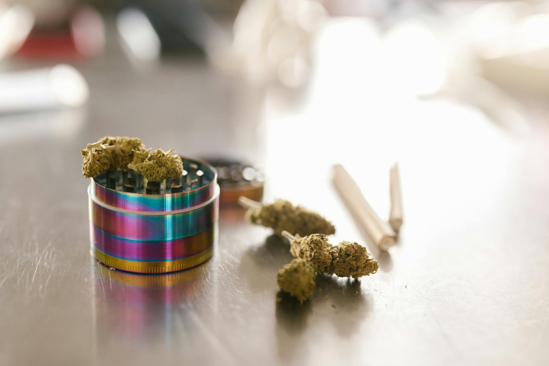 cannabis buds and a grinder